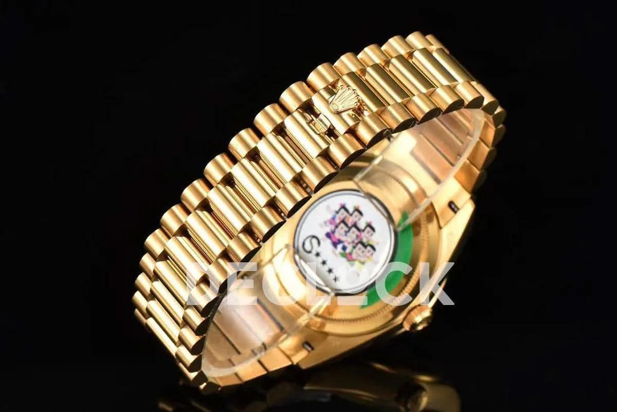 Replica Rolex Day-Date 36 128238 Malachite Diamond Roman Dial in Yellow Gold | Declock.