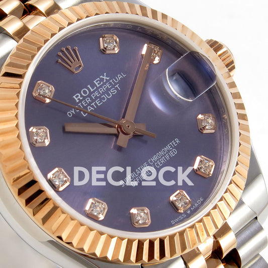 Rolex Datejust 31 278271 Purple Diamond Rose Two-Tone Jubilee XRF A2236 replica - Angled macro view of the purple gem dial, rose-tone fluted bezel, hands and magnified date lens