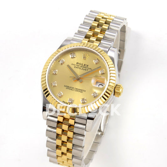 Rolex Datejust 31 278273 Champagne Diamond Yellow Two-Tone Jubilee XRF A2236 replica - Standing three-quarter watch view with champagne gem-set dial and steel/yellow Jubilee bracelet