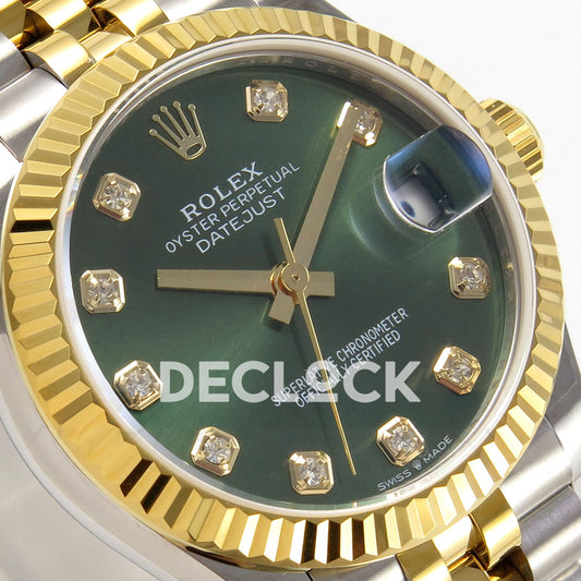 Rolex Datejust 31 278273 Green Diamond Yellow Two-Tone Jubilee XRF A2236 replica - Close-up of the green gem-index dial, native gold-tone hands, date cyclops and fluted yellow-tone bezel