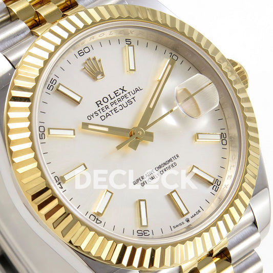 Rolex Datejust 41 126333 Silver Jubilee QF JH3235 Free Sprung replica - diagonal macro of the silver sunburst luminous-baton dial with gold frames and yellow fluted bezel