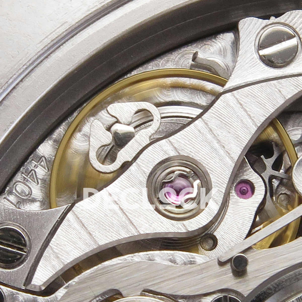 Audemars Piguet Royal Oak Offshore 26420 DDF replica - original balance wheel, screws and purple jewels in close-up
