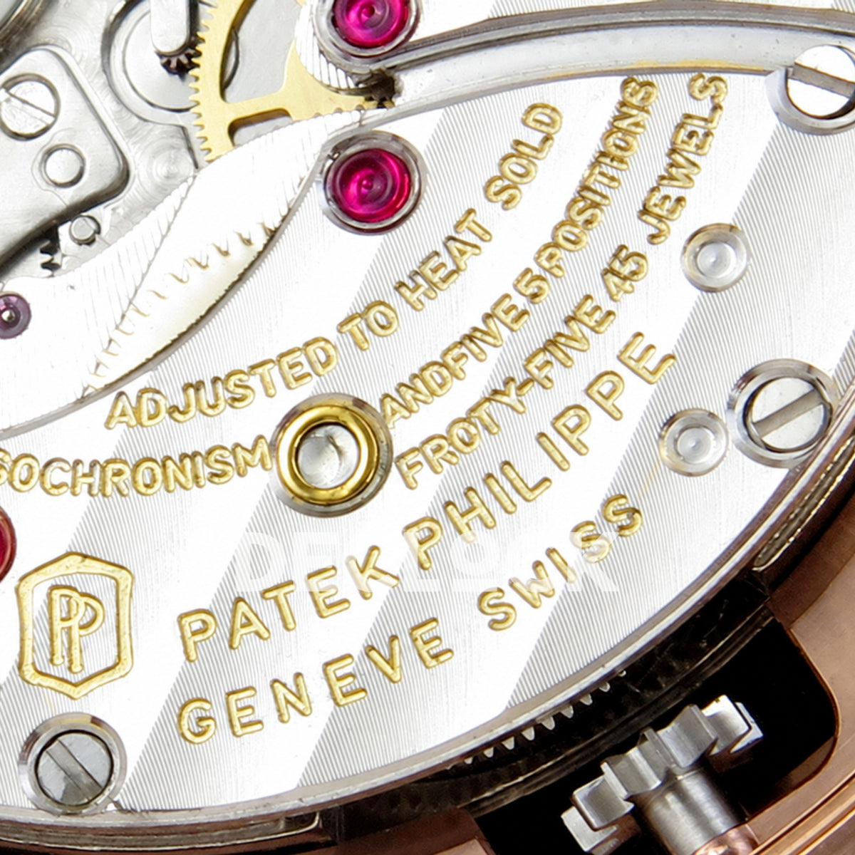 Patek Philippe Celestial 6102 BLSF replica with black dial, gem-set bezel and rose-gold-tone bracelet — movement engraving macro