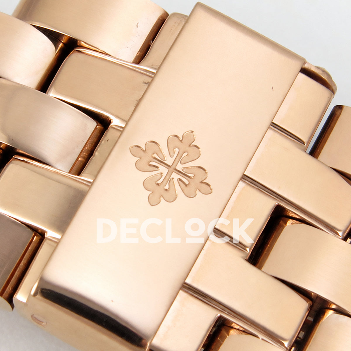 Patek Philippe Celestial 6102 BLSF replica with black dial, gem-set bezel and rose-gold-tone bracelet — clasp emblem close-up