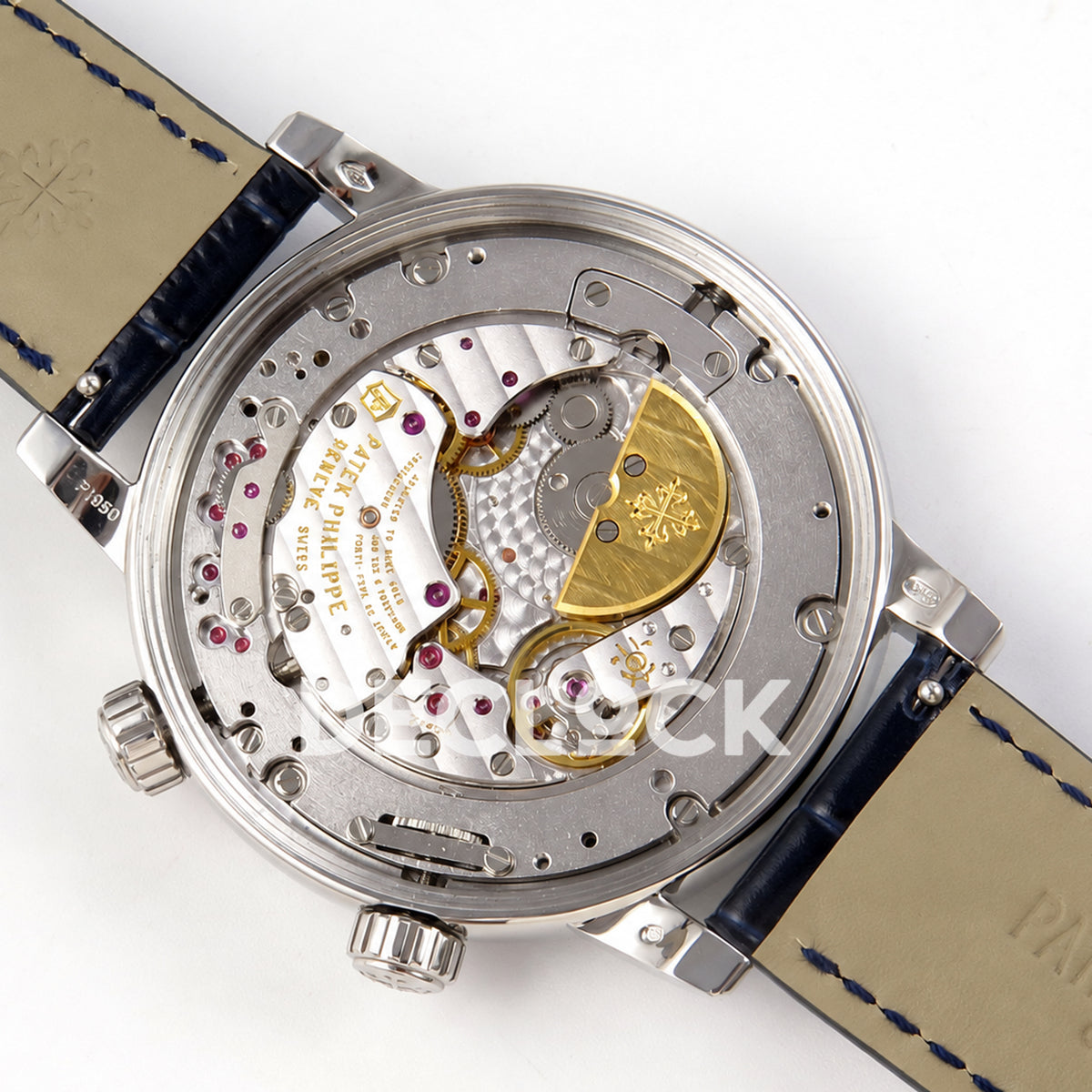 Patek Philippe Celestial 6104P-010 PPF replica with blue dial and clear stone bezel — exposed movement with rotor facing right