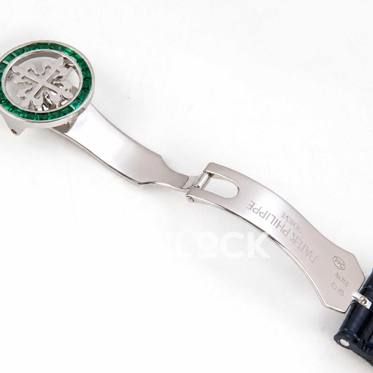 Patek Philippe Celestial 6104/13P-010 PPF replica with blue dial and green stone bezel — open clasp front