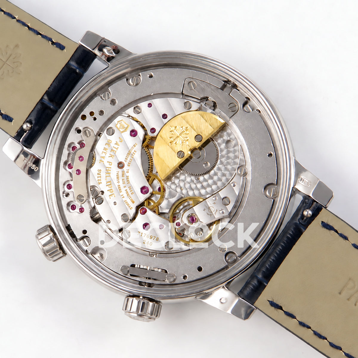 Patek Philippe Celestial 6104/12P-010 PPF replica with blue dial and red-purple stone bezel — exposed movement and angled micro rotor