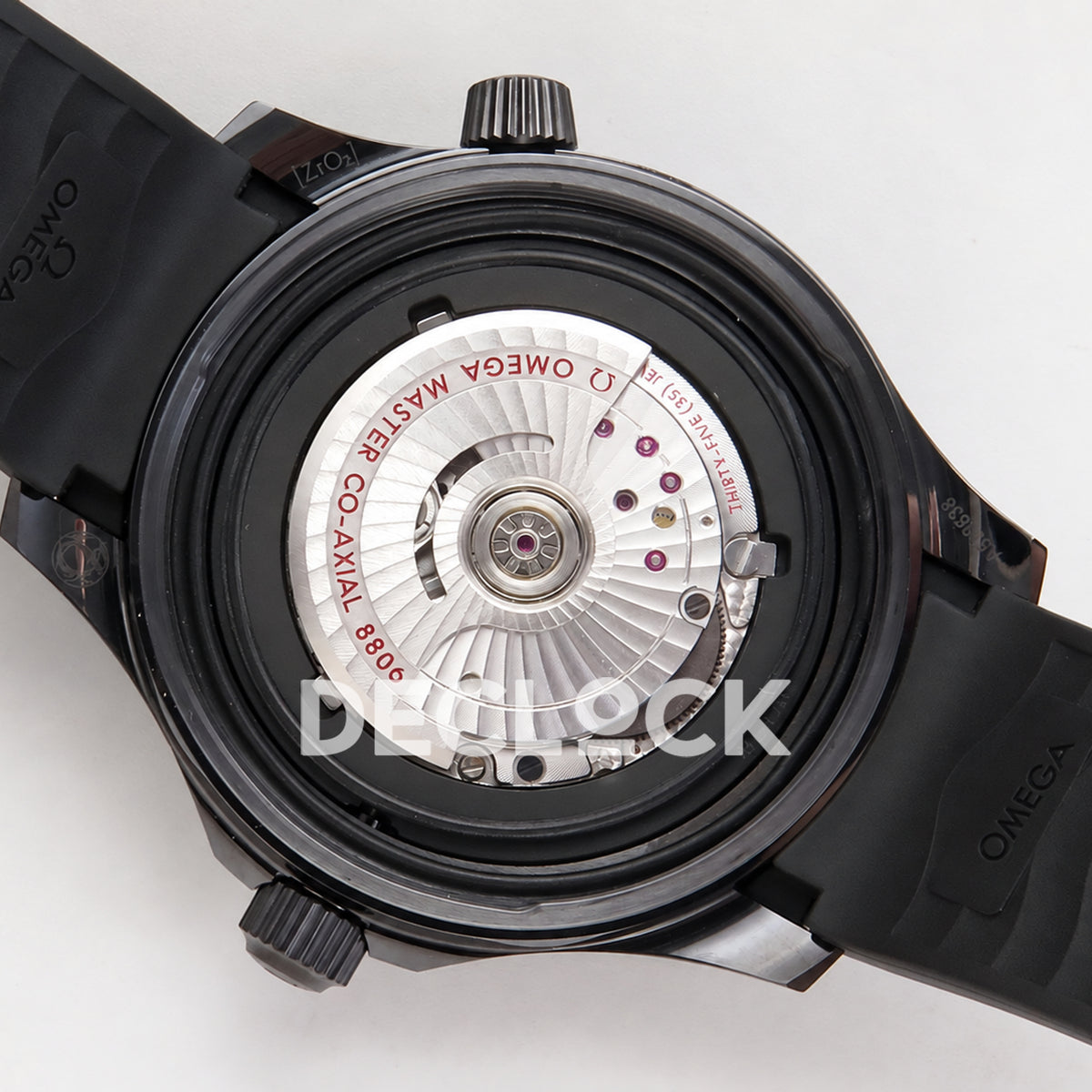 Omega Seamaster Diver 300M ORF Black Black ceramic DLC rubber 8806 Free Sprung — open caseback movement view