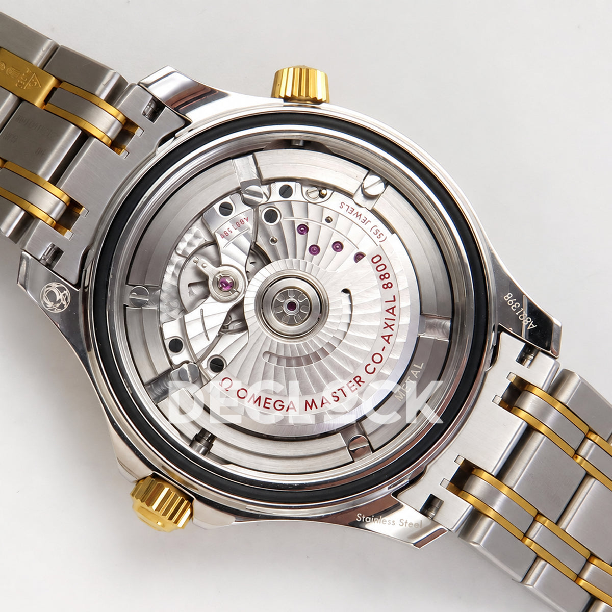 Omega Seamaster Diver 300M ORF Blue Steel Yellow Gold 8800 Free Sprung — open caseback rotor view