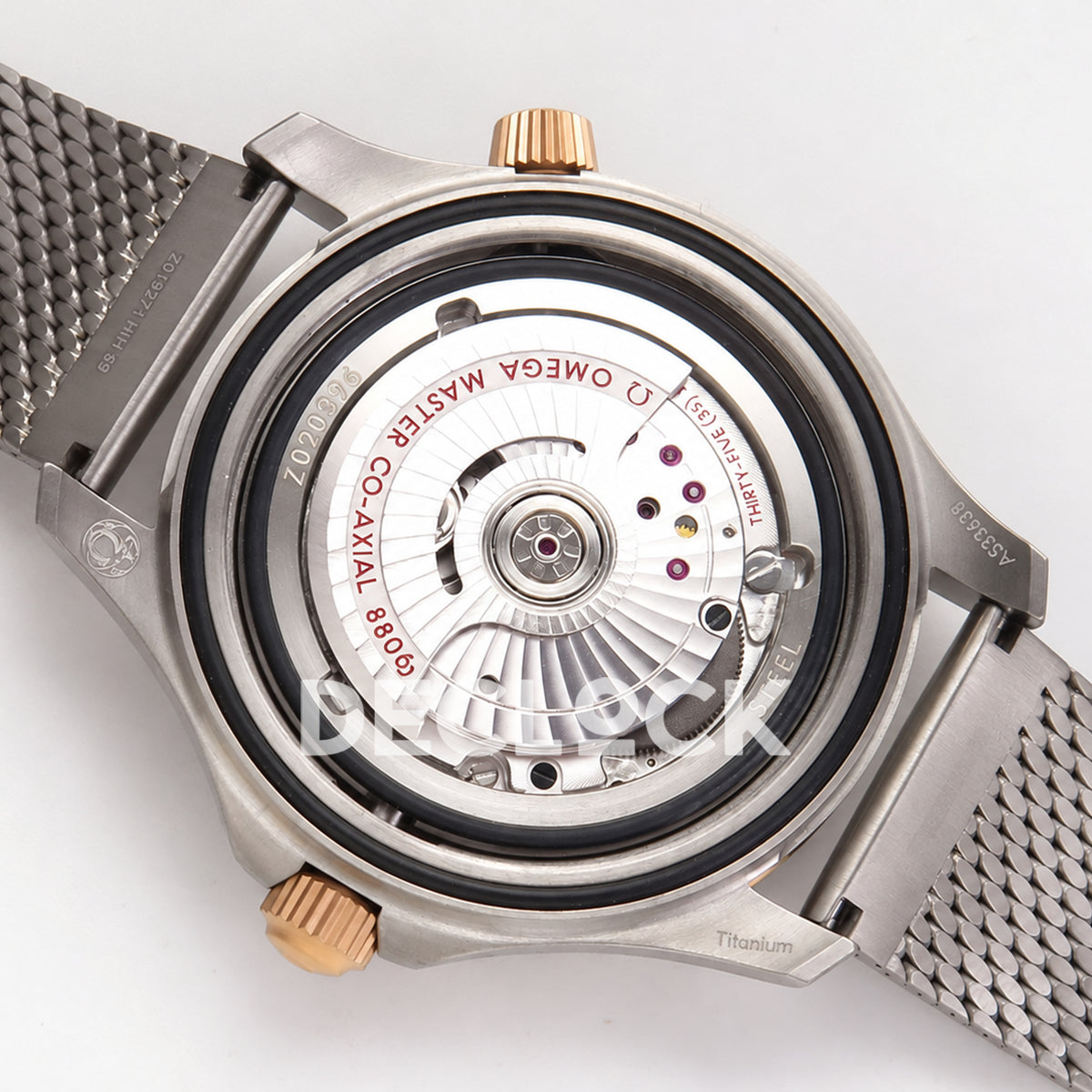Omega Seamaster Diver 300M Green Titanium Bronze Gold ORF 8806 Free Sprung — open caseback movement view