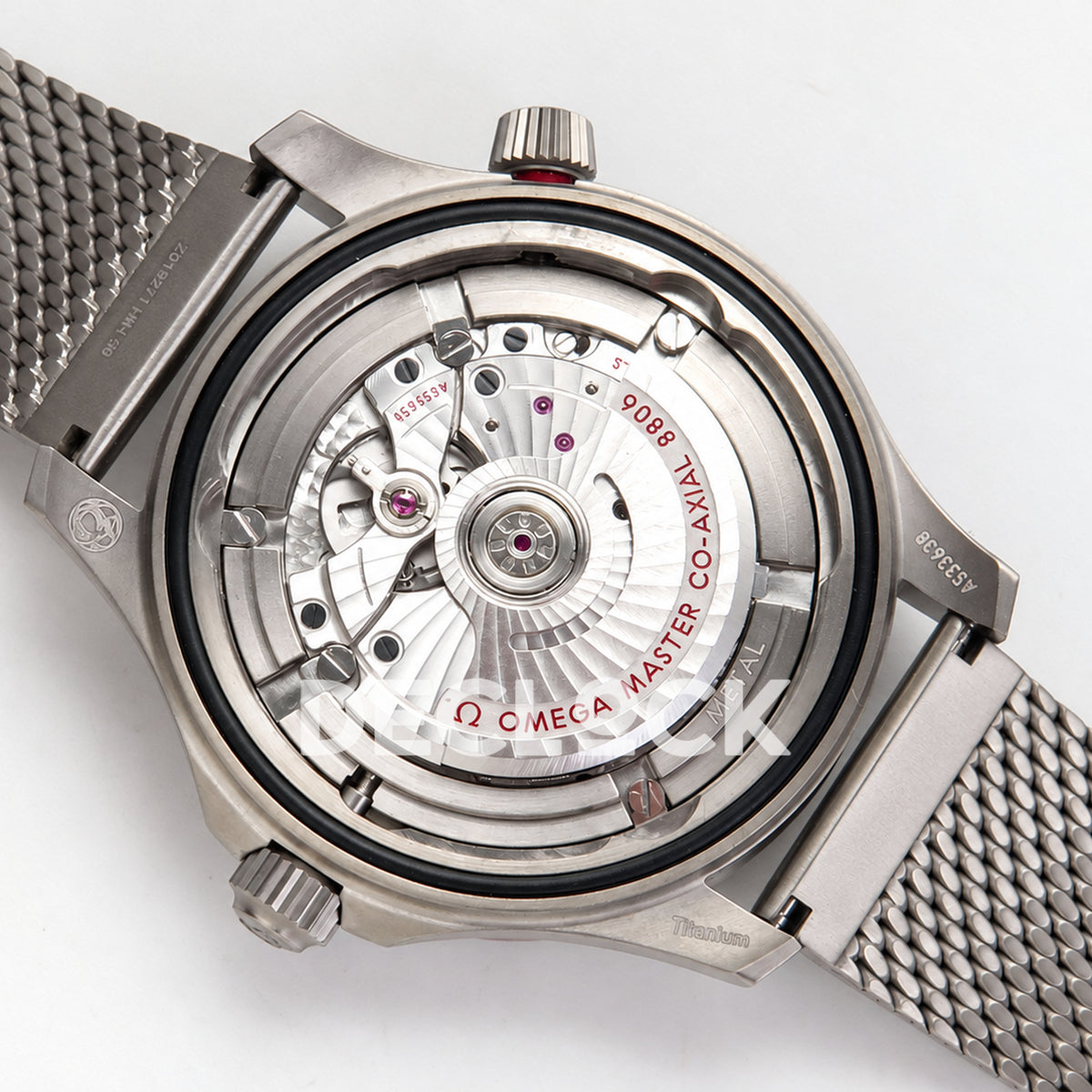 Omega Seamaster Diver 300M No Time To Die ORF titanium mesh 8806 Free Sprung — open caseback rotor view