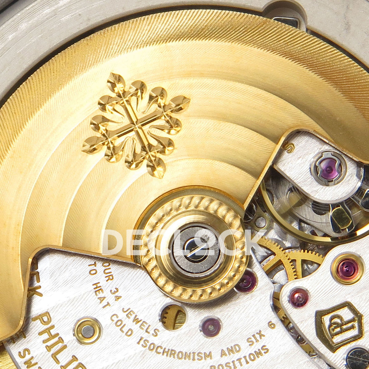 Patek Philippe Aquanaut 5168G APWF replica - gold-tone rotor, original Patek cross, gears and jewels close-up