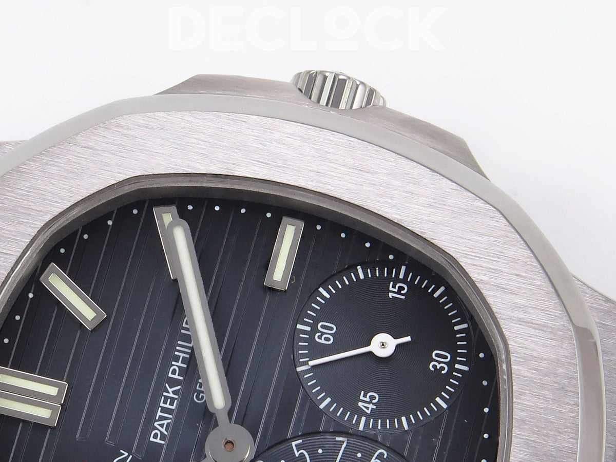 Nautilus 5712 PPF V4+ steel crown, brushed bezel and blue dial detail