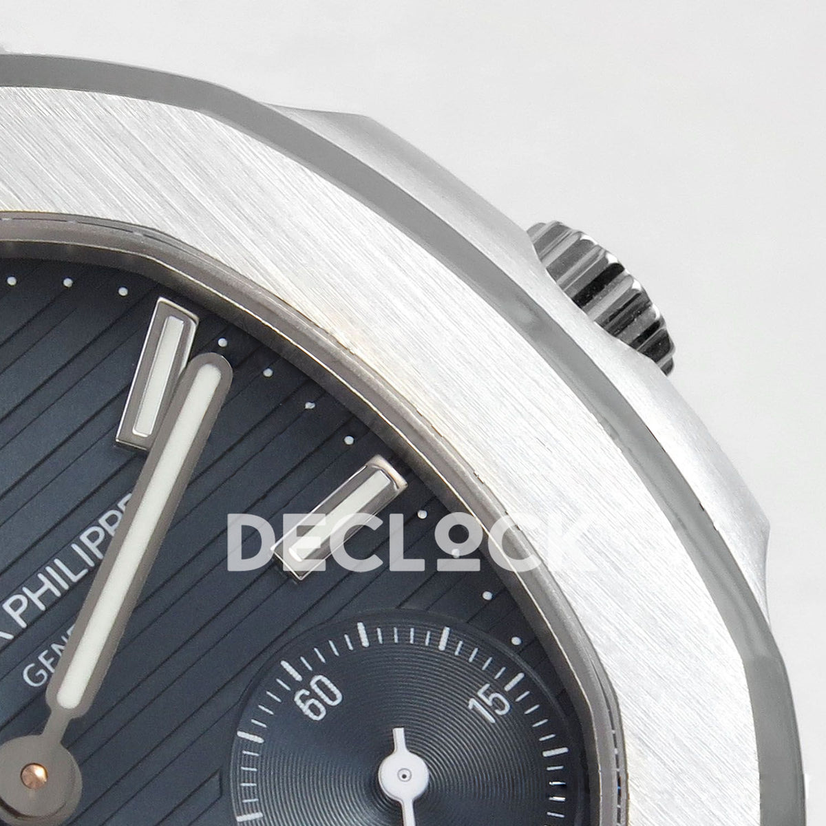 Nautilus 5712 WSF crown, polished bezel and blue dial marker close-up