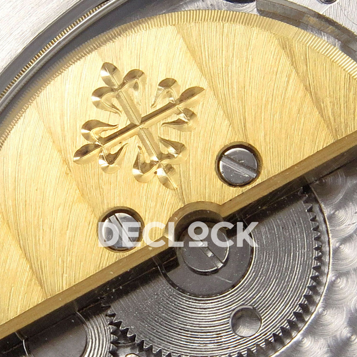 Patek Philippe Nautilus 5712 WSF JH240 — gold micro rotor with raised Calatrava emblem detail