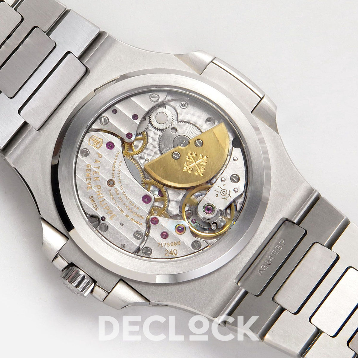 Patek Philippe Nautilus 5712 WSF JH240 — open caseback showing the photographed movement bridge engraving, gold micro rotor and calibre detail