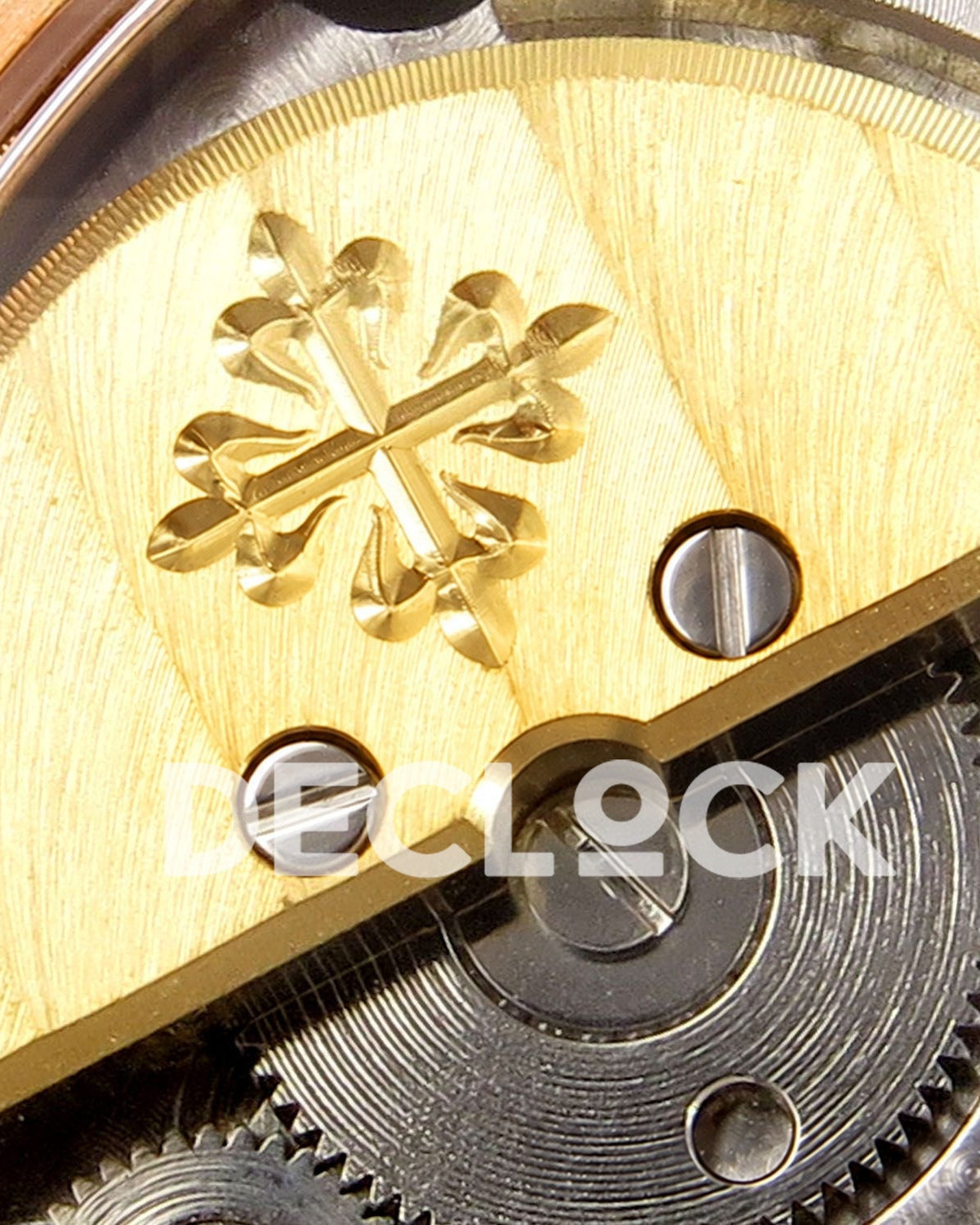 Patek Philippe Nautilus 5712 WSF, gold tone micro rotor cross and movement macro