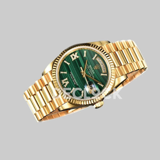 Replica Rolex Day-Date 36 128238 Malachite Diamond Roman Dial in Yellow Gold | Declock.