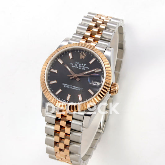 Rolex Datejust 31 278271 Dark Gray Baton Rose Two-Tone Jubilee XRF A2236 replica - Standing three-quarter view of the dark gray baton dial, fluted rose-tone bezel and steel/rose Jubilee bracelet