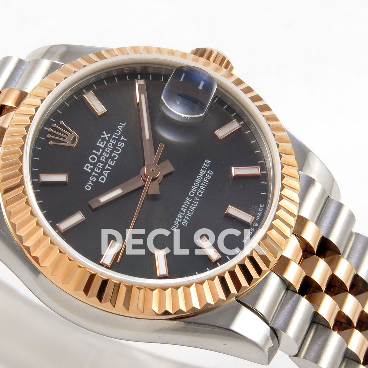 Rolex Datejust 31 278271 Dark Gray Baton Rose Two-Tone Jubilee XRF A2236 replica - Close angled view of the dark gray baton dial, native luminous hand inlays, slender secondhand, date lens and rose-tone fluted bezel