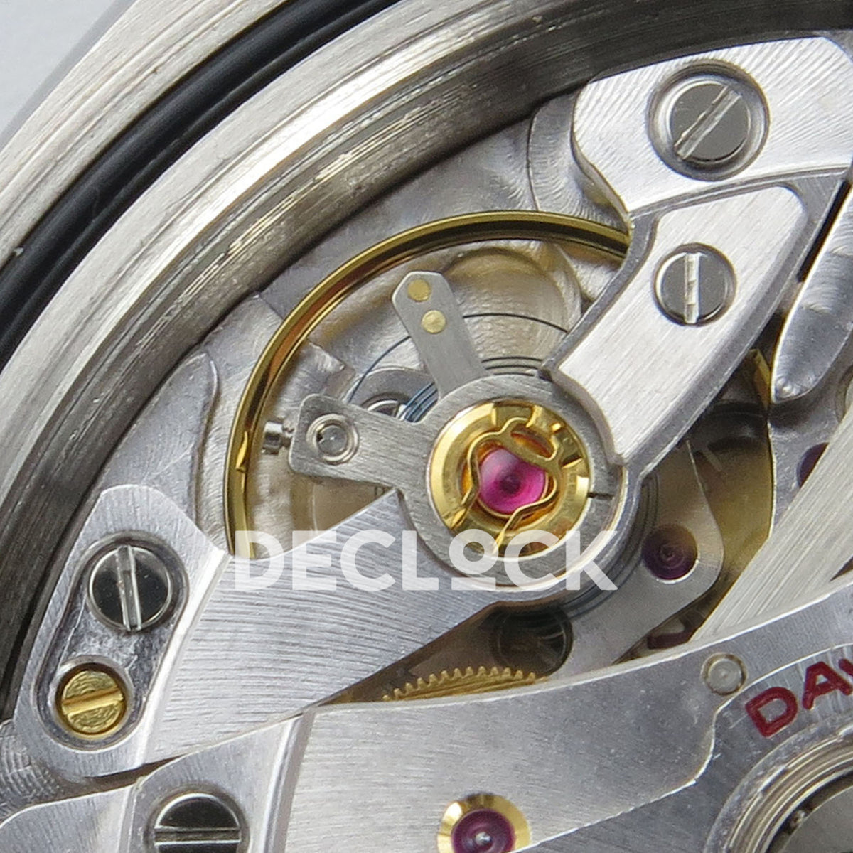 Rolex Daytona 116519 VF replica - original gold balance wheel, purple jewel, regulator and mechanical bridges close-up