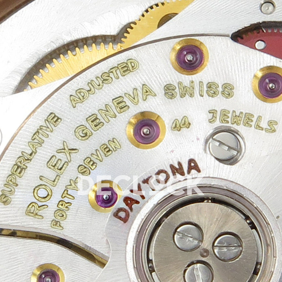 Rolex Daytona 116595RBOW AVF replica - original gold Rolex Geneva Swiss, FORTY-SEVEN and 44 Jewels inscriptions in close-up