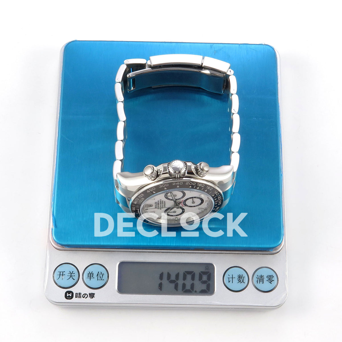 Rolex Daytona 126500 BTF replica, watch on digital scale showing 140.9 grams