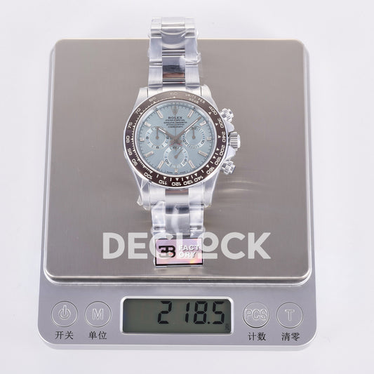 Rolex Daytona 126506 3BF replica - original watch and factory label on scale displaying 218.5 grams
