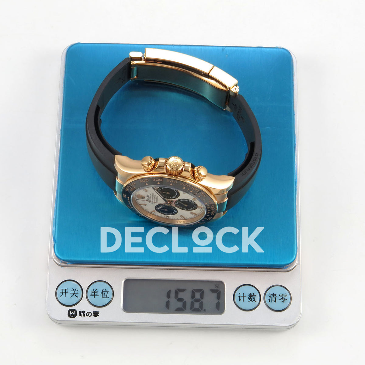 Rolex Daytona 126515 Clean Plus replica - watch on digital scale showing 158.7 grams