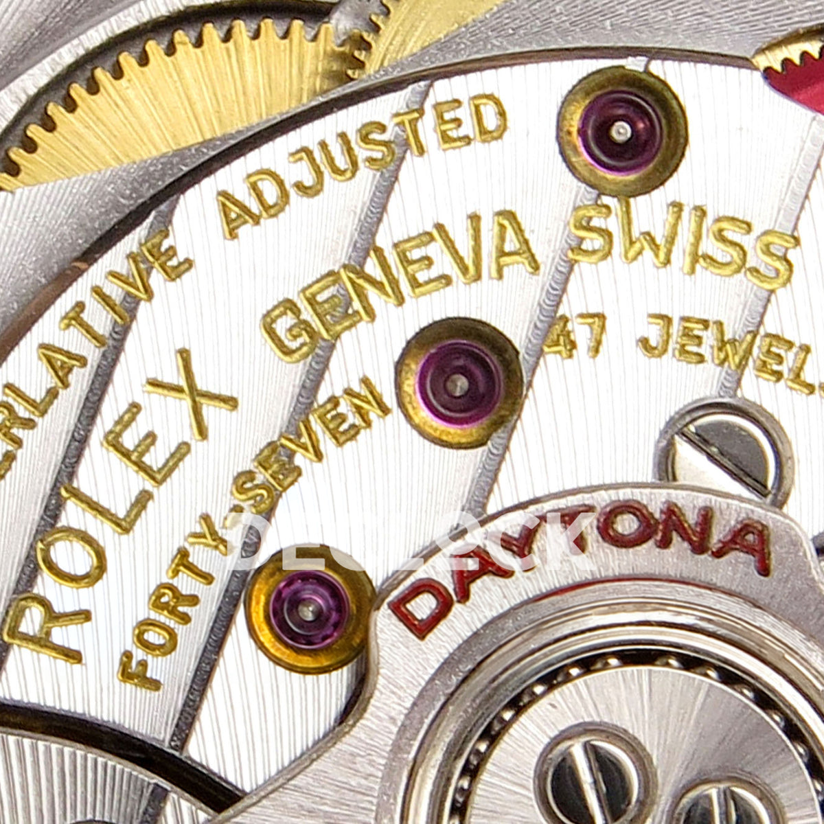Rolex Daytona 126518 ZF replica - Rolex Geneva Swiss and 47 jewels movement engraving close-up