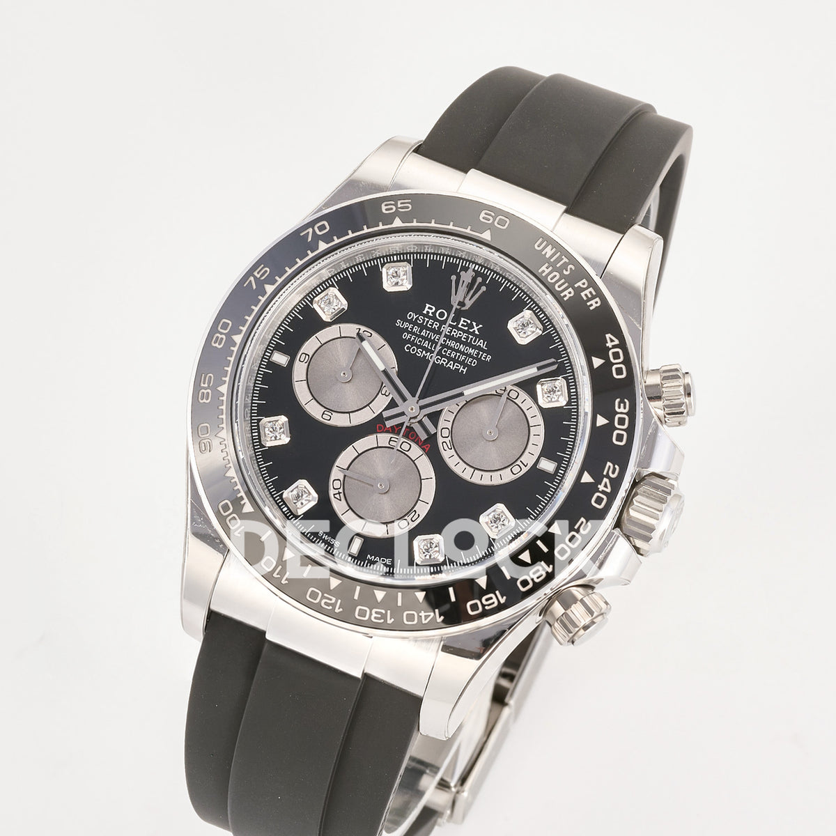 Rolex Daytona 126519 ARF replica - original black dial with silver chronograph faces, clear stone hour markers, silver hands, white Rolex printing and red Daytona text, black ceramic tachymeter bezel and black Oysterflex strap