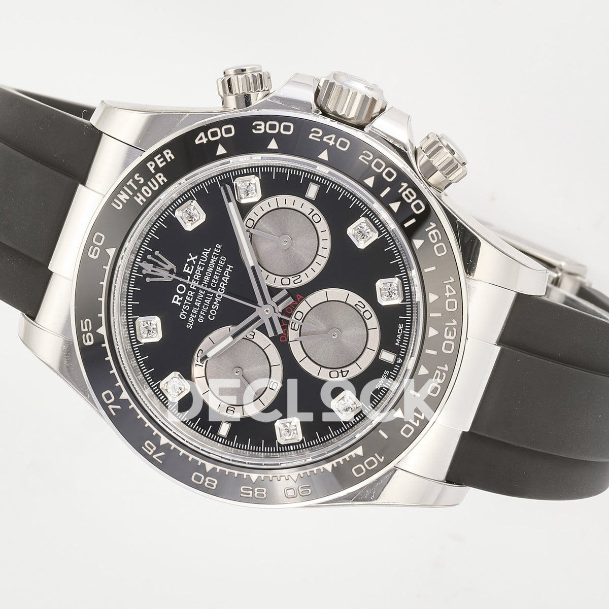 Rolex Daytona 126519 ARF replica - original black dial with silver chronograph faces, clear stone hour markers, silver hands, white Rolex printing and red Daytona text, black ceramic tachymeter bezel and black Oysterflex strap