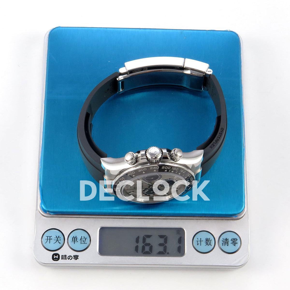 Rolex Daytona 126519 WF JH4131 grey black dial white-gold-style replica - weight shown as 163.1 on a digital scale