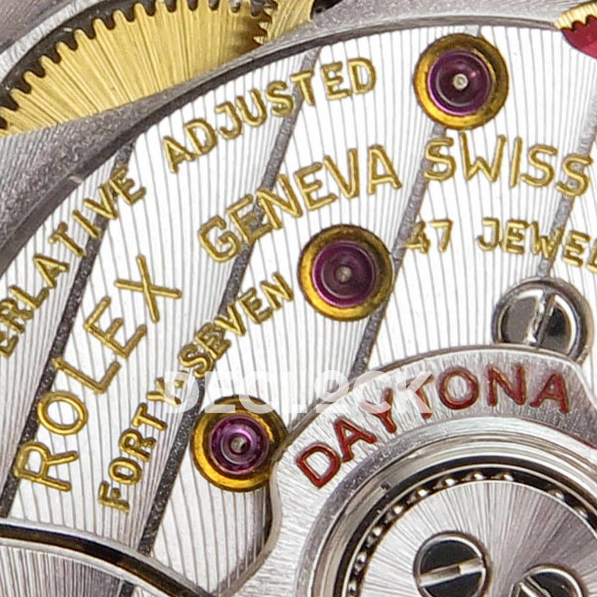 Rolex Daytona 126519 ZF replica - Rolex Geneva Swiss and 47 jewels movement engraving close-up