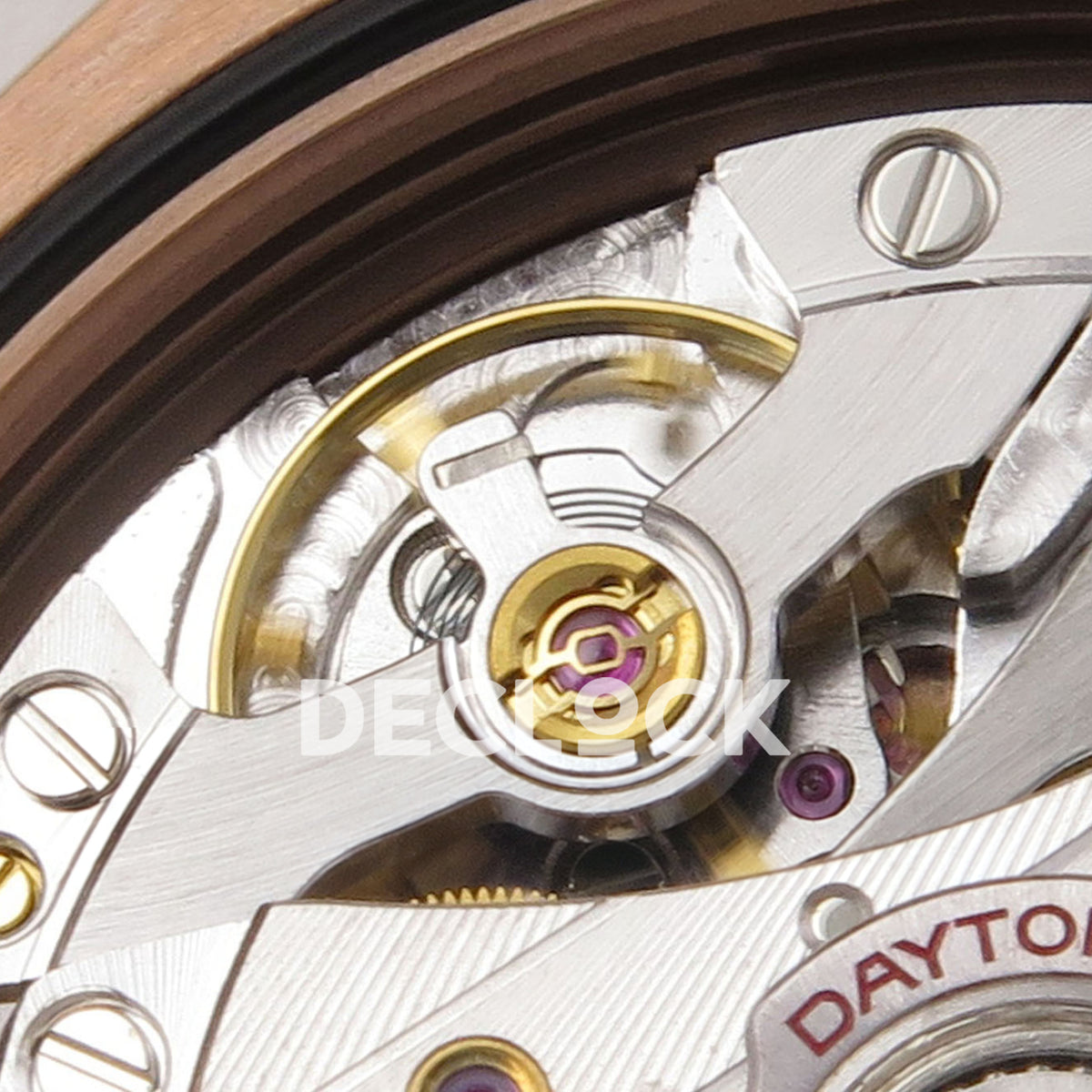 Rolex Daytona 126595TBR QF replica - balance wheel and jewel close-up