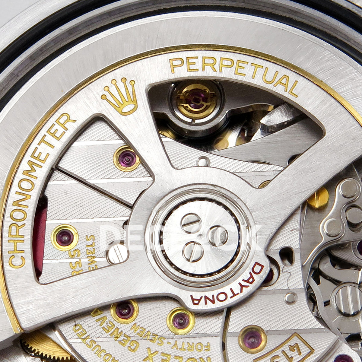 Rolex Daytona 126599TBR QF replica - original gold-coloured automatic rotor engraving close-up