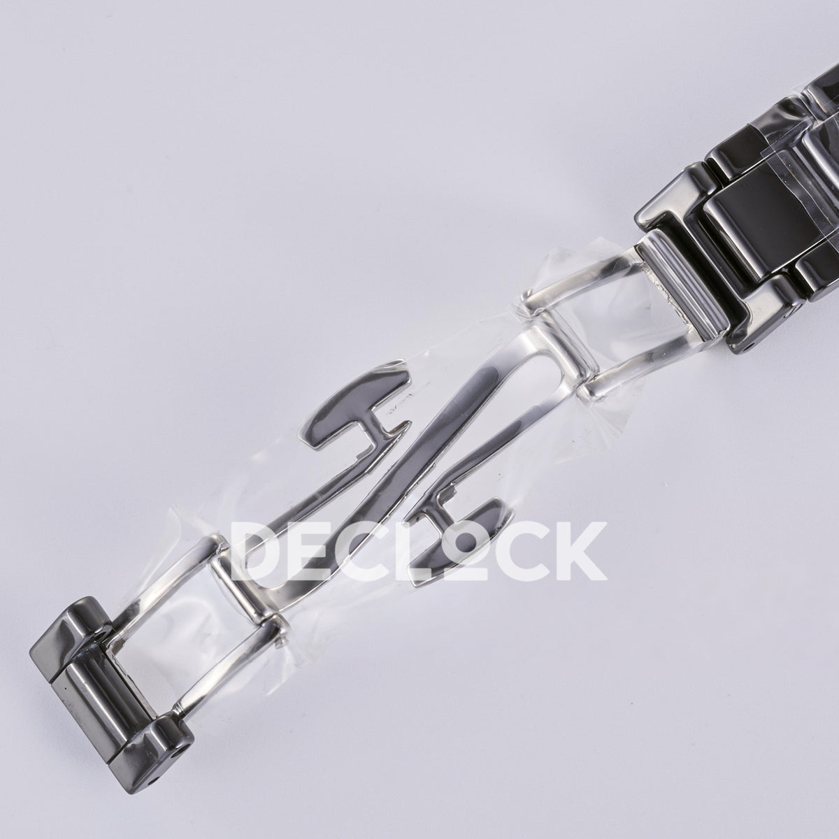 Rolex Daytona ADGF replica - opposite view of open butterfly clasp and original protective wrapping