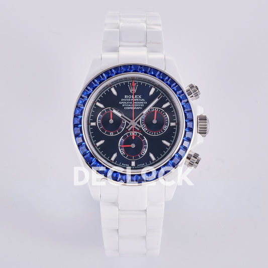 Rolex Daytona ADGF replica - front view of dark navy dial, red chronograph hands, blue gem-set bezel and white ceramic bracelet