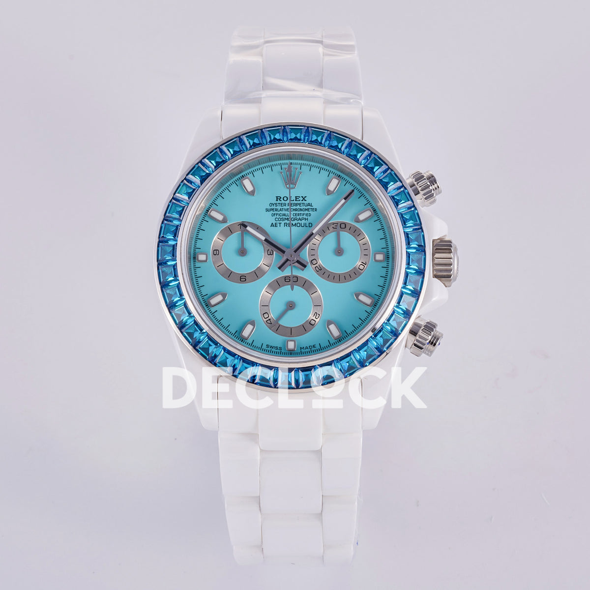 Rolex Daytona AET ADGF replica - front view of turquoise AET dial, silver chronograph rings, blue gem-set bezel and white ceramic bracelet