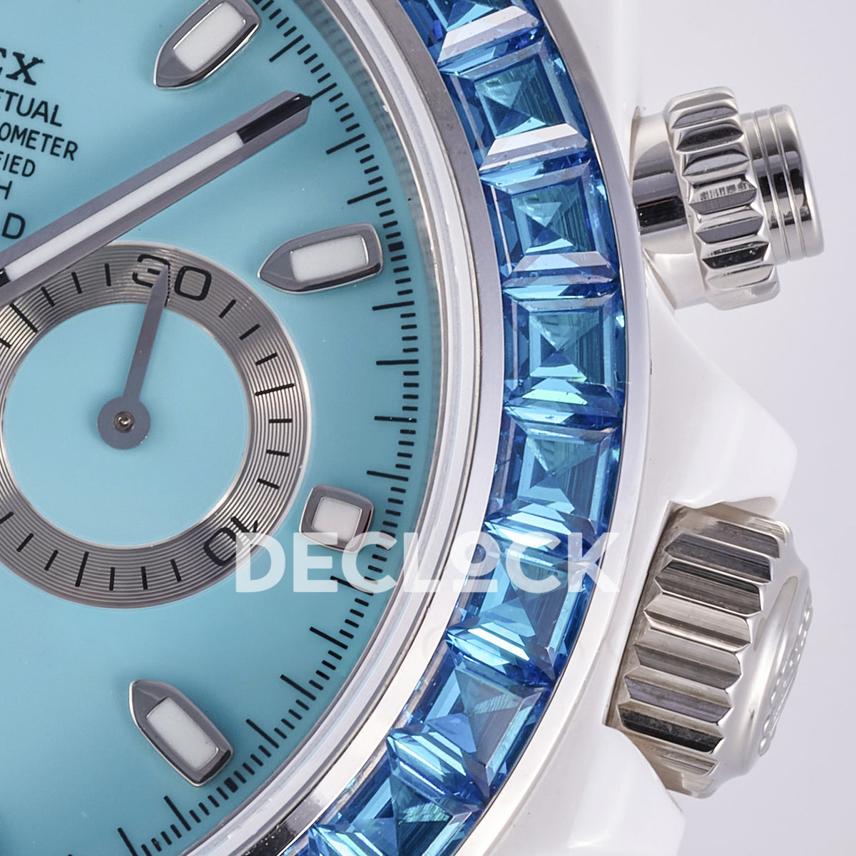 Rolex Daytona AET ADGF replica - dial luminous marker, blue faceted bezel stones, winding crown and pushers close-up