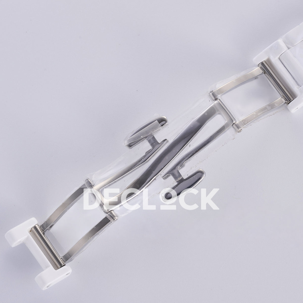 Rolex Daytona ADGF replica - opposite view of open butterfly clasp and original protective wrapping