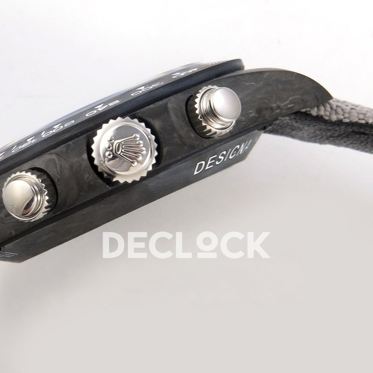 Rolex Daytona DIW Black Carbon DIWF replica - winding crown and chronograph pushers with Designa case marking